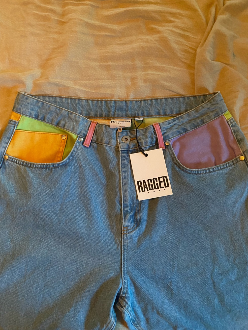Ragged Denim Jeans with Playground Multicolor Pocket Accents - Blue